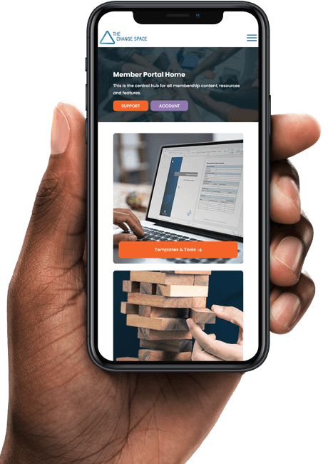 Man holding iPhone with portal homepage screen