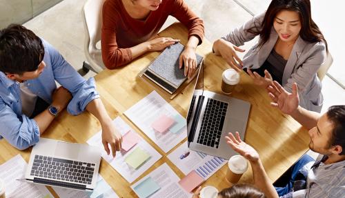 Stakeholders working at bench