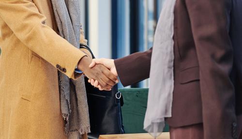 Executives shaking hands