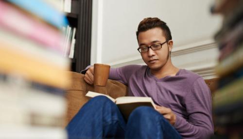 Man studying in library
