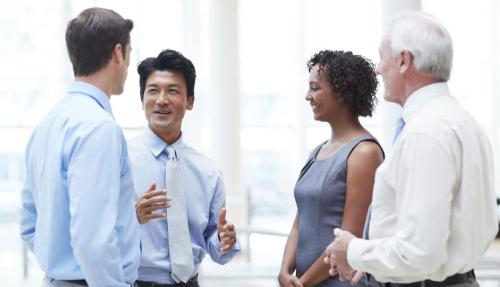 Professionals speaking in small group