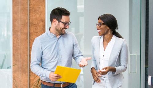 Multicultural professional couple talking