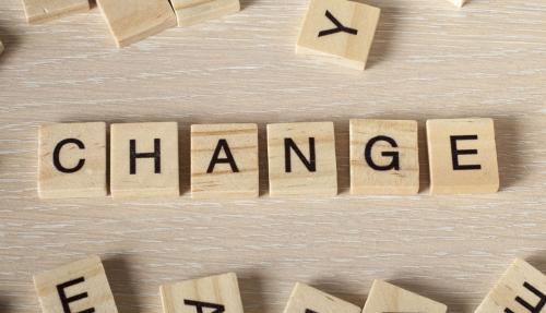 CHANGE spelt out in scrabble tiles