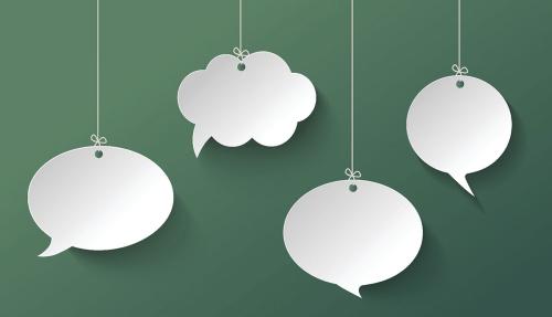 Concept image of speech bubbles against gree background